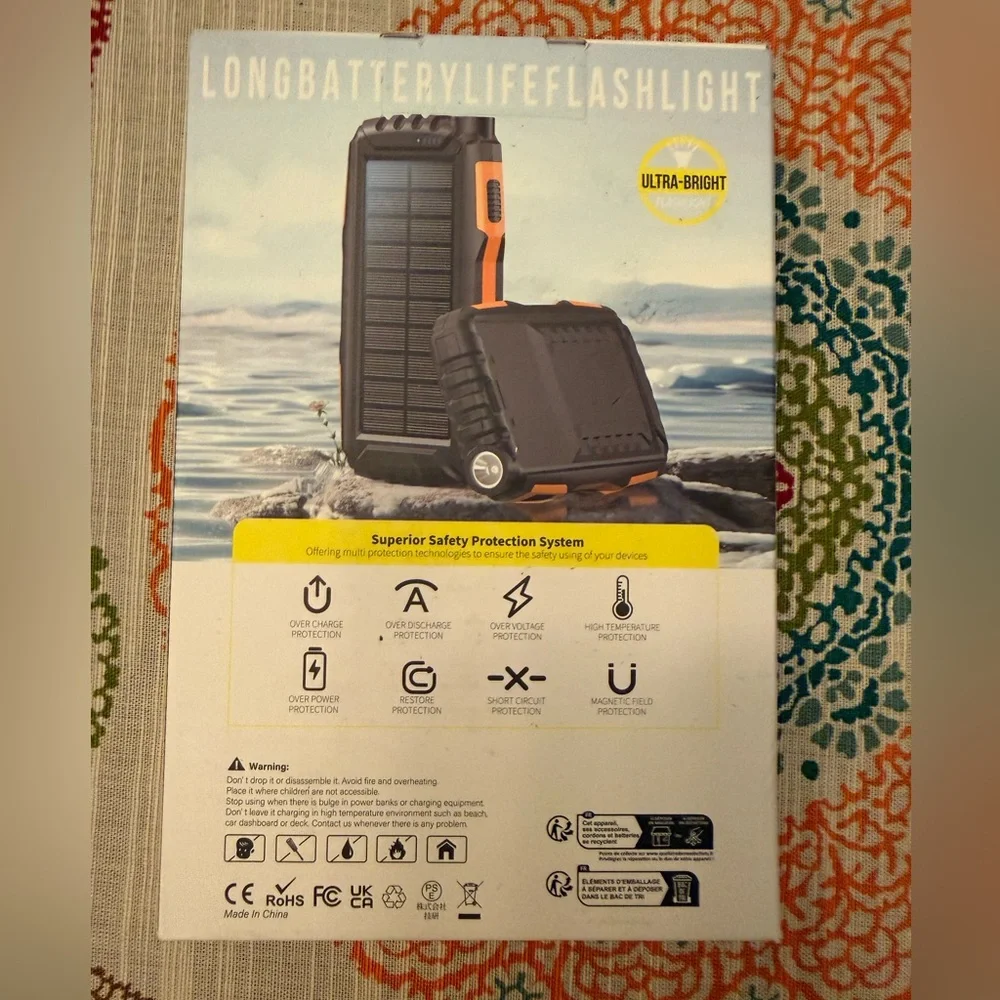 NWT Portable Solar Power Bank - Black and Orange